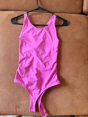 Francesca’s Pink Purple Crisscross Back Bodysuit NWT Size M